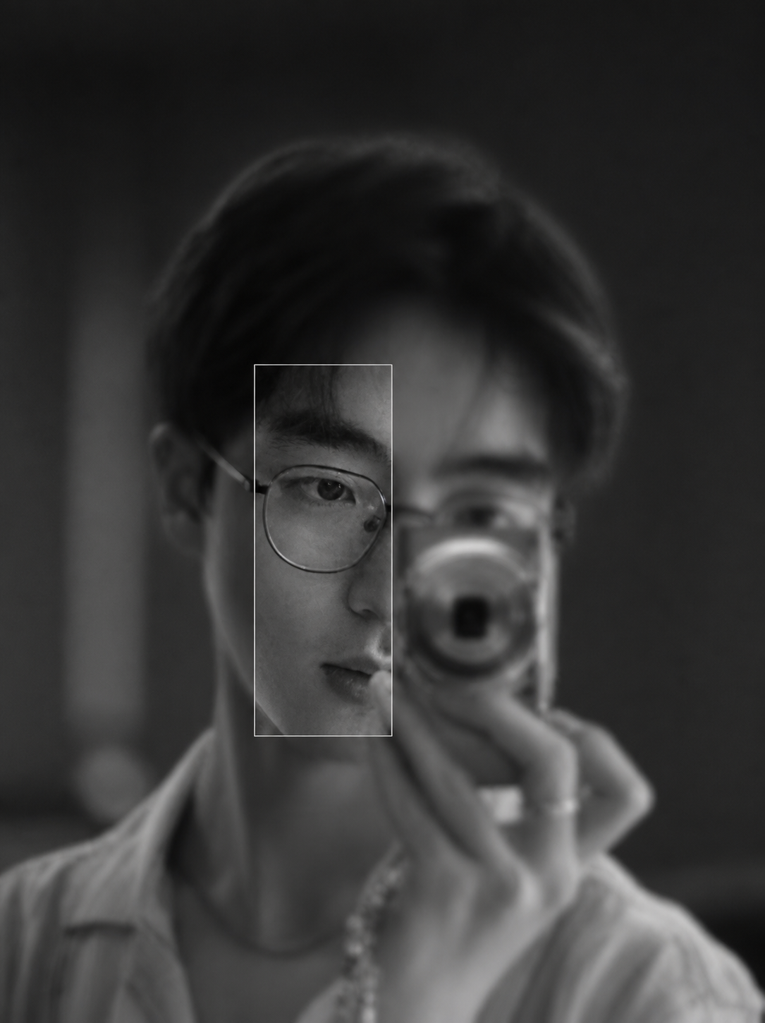 Black-and-white portrait of Zihe Huang